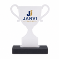 White two-handle trophy on black base with JANVI Trading print